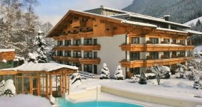 saalbach hinterglemm wellnesshotel theresia winter aussen 1